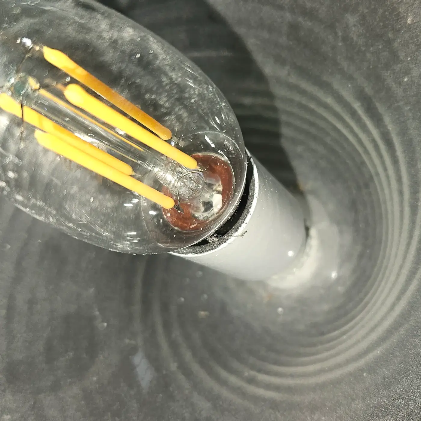 Dulled and dusted ribbed hand-blown glass shade